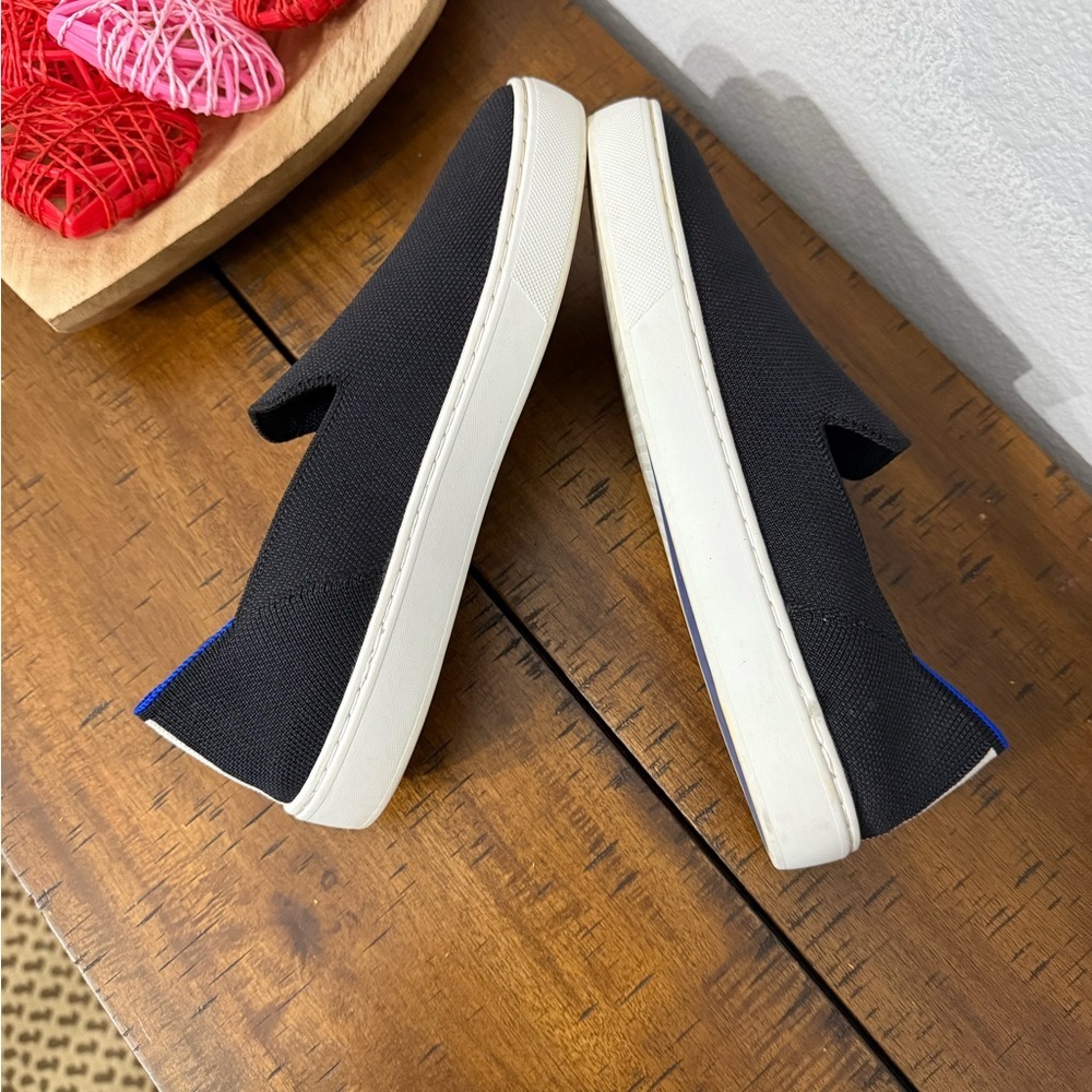 Rothy's The Original Slip On Sneaker in black solid with blue trim - Picture 3 of 8